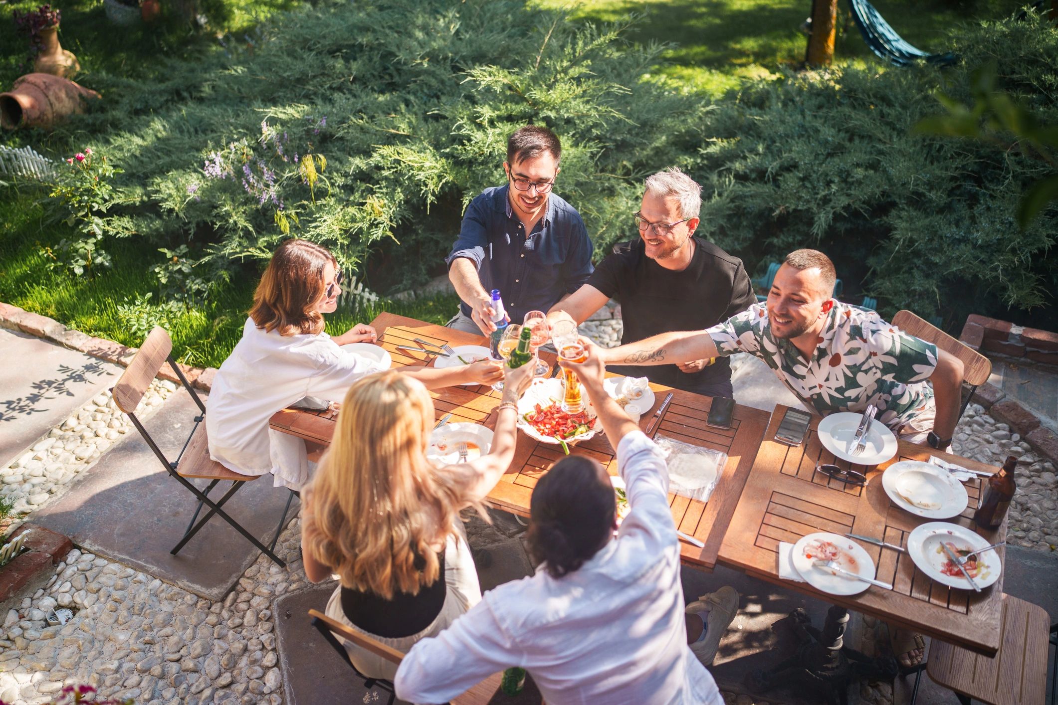 Friends toasting outdoors